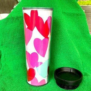 Starbucks 2013 16 ounce Tumbler  nice lid slides to close. Worn marks cup holder